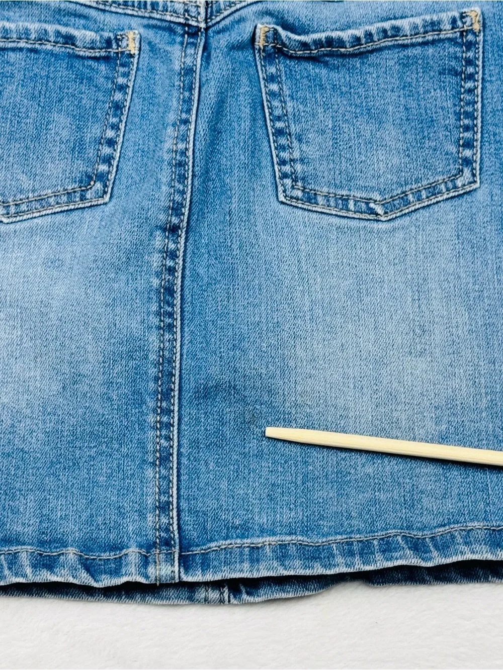 Lot of 2 girls denim skirts. The blue shirt is a size 8, black skirt is size 7/8